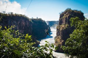 lady trying flying fox at victoria falls